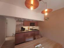 Notre zone d'activité pour ce service Refonte d’un intérieur avec création d’une cuisine moderne, coin repas intégré et plan de travail sur mesure à