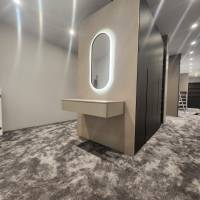 Notre zone d'activité pour ce service Création d’un meuble sur mesure pour une buanderie fonctionnelle avec rangements intégrés, plan de pliage et colonne technique à