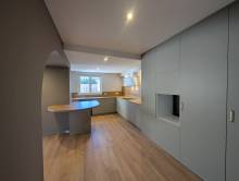 Notre zone d'activité pour ce service Création d’un meuble sur mesure pour une buanderie fonctionnelle avec rangements intégrés, plan de pliage et colonne technique à